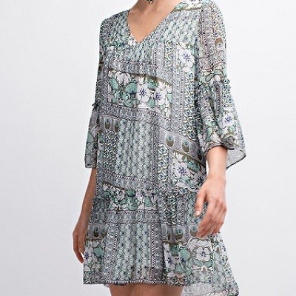 DROP WAIST RUFFLE HEM DRESS